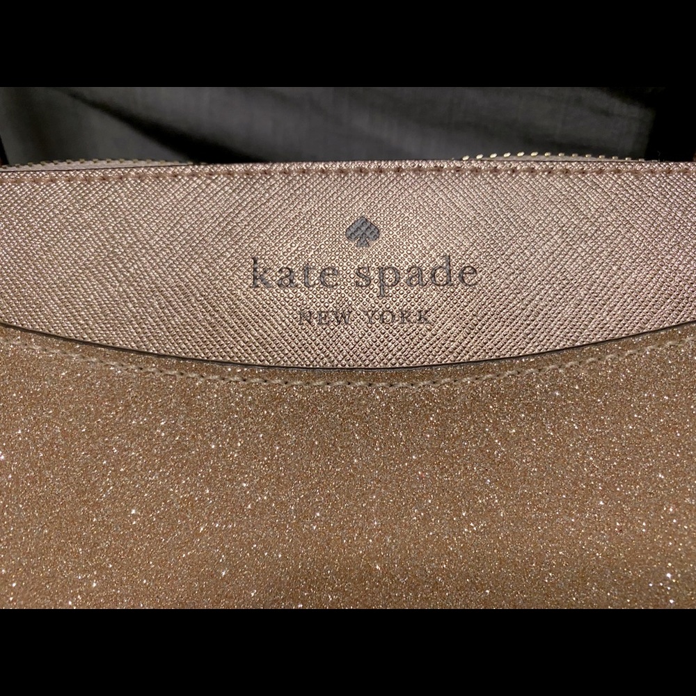 New with tags kate spade rose gold tote and matching cosmetics case